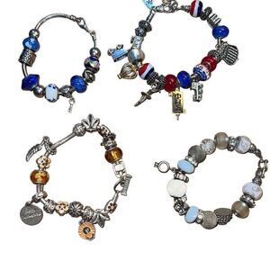Four Vintage Charm Bracelets